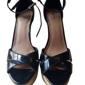 Massimo Heel, fuax patent leather with ankle strap and silver toned buckle.